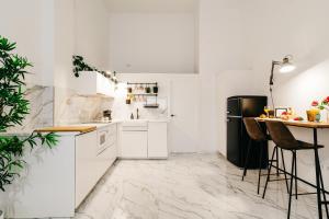 Η κουζίνα ή μικρή κουζίνα στο Casa Paca Triana Centro de Sevilla