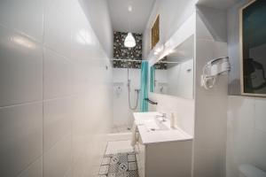 Kúpeľňa v ubytovaní Roller Aparthotel + 37 fotografií