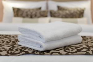 Posteľ alebo postele v izbe v ubytovaní Toledo Amman Hotel