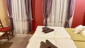 Łóżko lub łóżka w pokoju w obiekcie HOTEL - Pałac Słonowice