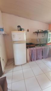 Kuchyň nebo kuchyňský kout v ubytování Suites Vila Verde em Búzios RJ.