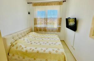 Postel nebo postele na pokoji v ubytování SeaView Apartments Rental Vlore
