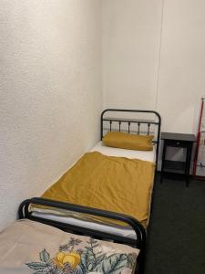 Ein Bett oder Betten in einem Zimmer der Unterkunft Eilenburg Apartments Nordsachsen