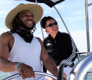 un hombre y una mujer en un barco en Williamsburg Charter Sails / Let's Go Sail, 