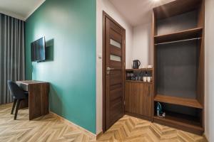 TV a/nebo společenská místnost v ubytování Flats4Rent Piłsudskiego 6