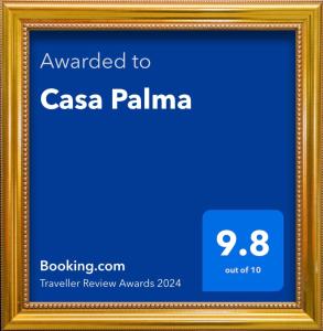a picture frame with the text awarded to casa palma at Casa Palma in São Miguel do Gostoso