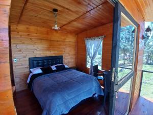 Postel nebo postele na pokoji v ubytování Cabañas Finca las acacias