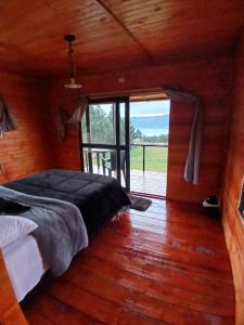 Postel nebo postele na pokoji v ubytování Cabañas Finca las acacias