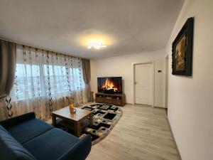 Posezení v ubytování Apartament 3 camere Palas