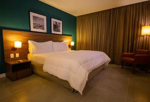 Postel nebo postele na pokoji v ubytování Diff Hotel - by Easy Hotéis