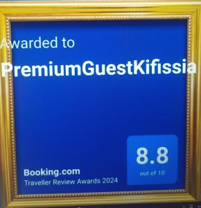 a picture of a sign that reads awarded to pentimurgurguckritisk at PremiumGuestKifissia in Athens