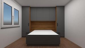 ein Schlafzimmer mit einem Bett in einem Zimmer mit einem Fenster in der Unterkunft Apartment for rent in Deçan in Deçan