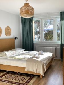 Posteľ alebo postele v izbe v ubytovaní Między górami. Apartament w Cisnej
