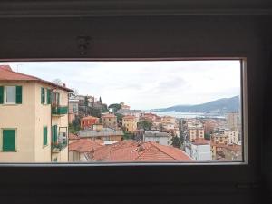 a view of a city from a window at bijou loft in La Spezia