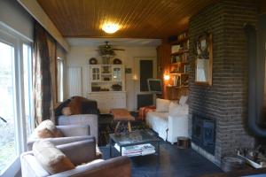 Predel za sedenje v nastanitvi B&B La Source Houffalize