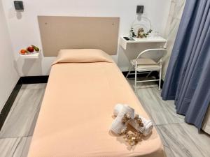 Postel nebo postele na pokoji v ubytování Hotel Océano Centro