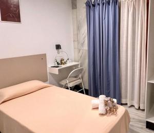 Postel nebo postele na pokoji v ubytování Hotel Océano Centro