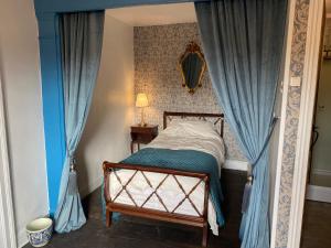 Postel nebo postele na pokoji v ubytování Moon River Bellac Chambre d'hotes