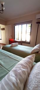 Кровать или кровати в номере Habitación de huéspedes con entrada independiente