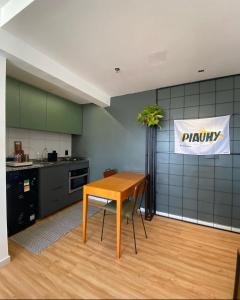 Cuisine ou kitchenette dans l'établissement Apartamento Piauhy - Studio