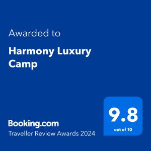 תעודה, פרס, שלט או מסמך אחר המוצג ב-Harmony Luxury Camp