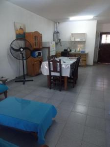 Kuchyň nebo kuchyňský kout v ubytování Departamentos Santiago