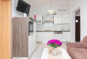 Kuchyňa alebo kuchynka v ubytovaní Apartments Glorija