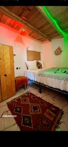 Postel nebo postele na pokoji v ubytování TAMRI BEACH HOUSE