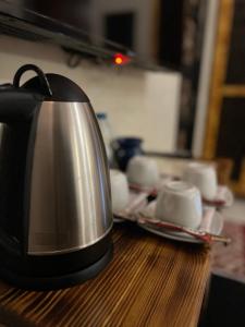 Příslušenství pro přípravu čaje a kávy v ubytování Riad Deluxe