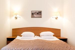 Narva Hotell & Spaa客房内的一张或多张床位