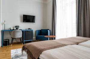 Narva Hotell & Spaa客房内的一张或多张床位