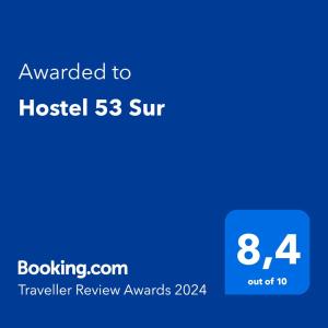 a blue text box with the words upgraded to host sur at Hostel 53 Sur in Puerto Natales