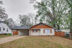 a white house with a brick at Stunning Jackson Home about 2 Mi to Downtown! in Jackson