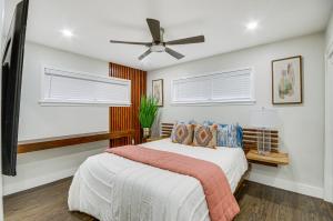 a bedroom with a bed and a ceiling fan at Stunning Jackson Home about 2 Mi to Downtown! in Jackson