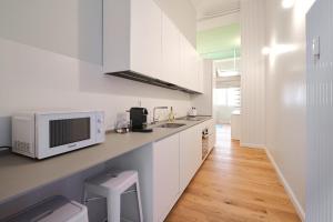 Kjøkken eller kjøkkenkrok på MILAN design Loft-Hosted by Sweetstay