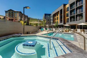 an image of a swimming pool at a hotel at Canyons Resort #134 in Park City