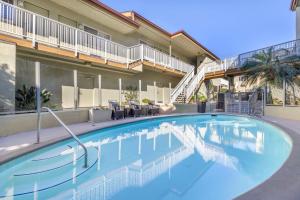 a large swimming pool in front of a building at Best Western Plus Beach View Lodge in Carlsbad