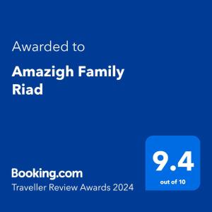 una tarjeta azul con el texto otorgado a la rehabilitación familiar americana en Amazigh Family Riad, en Imlil