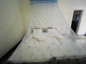 Postel nebo postele na pokoji v ubytování Weeragiri home stay