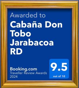 ein Bild eines Zeichens in einem goldenen Rahmen in der Unterkunft Cabaña Don Tobo Jarabacoa RD in Jarabacoa