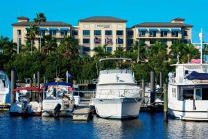 a group of boats are docked in a marina at Four Points by Sheraton Punta Gorda Harborside in Punta Gorda