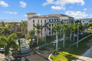 an aerial view of a resort with palm trees at Four Points by Sheraton Punta Gorda Harborside in Punta Gorda