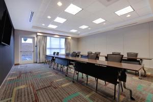 a conference room with a long table and chairs at Residence Inn by Marriott Pullman in Pullman +42 photos