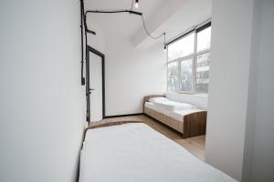Postel nebo postele na pokoji v ubytování 68 Hostel