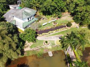an aerial view of a house with a garden at Madikale Resort in Mirigama