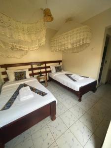 Postel nebo postele na pokoji v ubytování Suba Motel