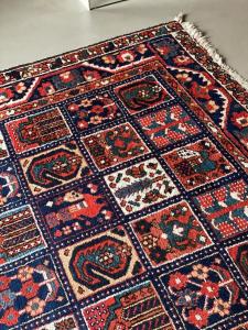 a rug with patterns on it sitting on a floor at Alpenchalet Walchensee in Walchensee