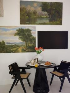 TV a/nebo společenská místnost v ubytování Casa Calamondino
