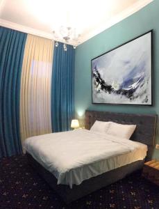 Letto o letti in una camera di Belona Hotel