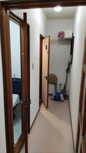 和室+洋室+日本酒飲放題/Premier Guest House客房内的一张或多张床位